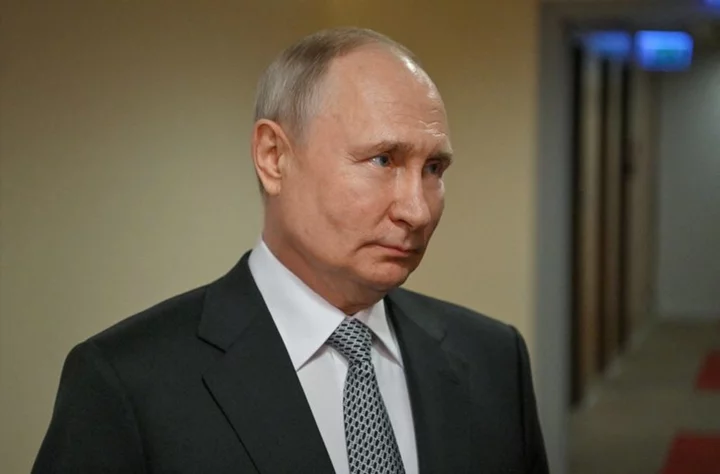 Russia's Putin snubs Prigozhin, Biden quips about poison