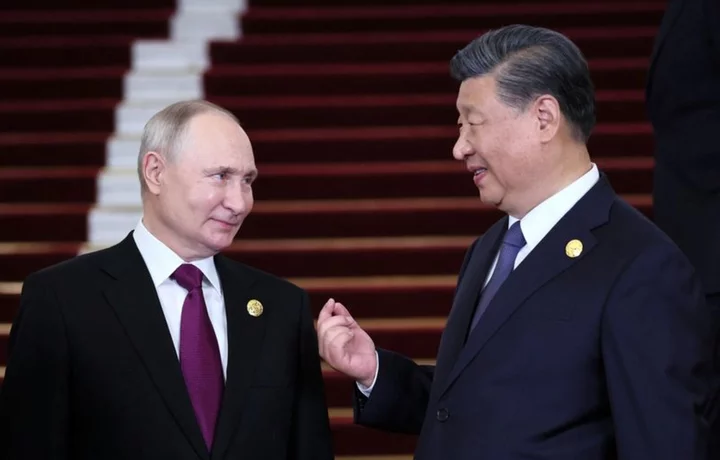 Putin praises 'dear friend' Xi, pitches Russia's Northern Sea route
