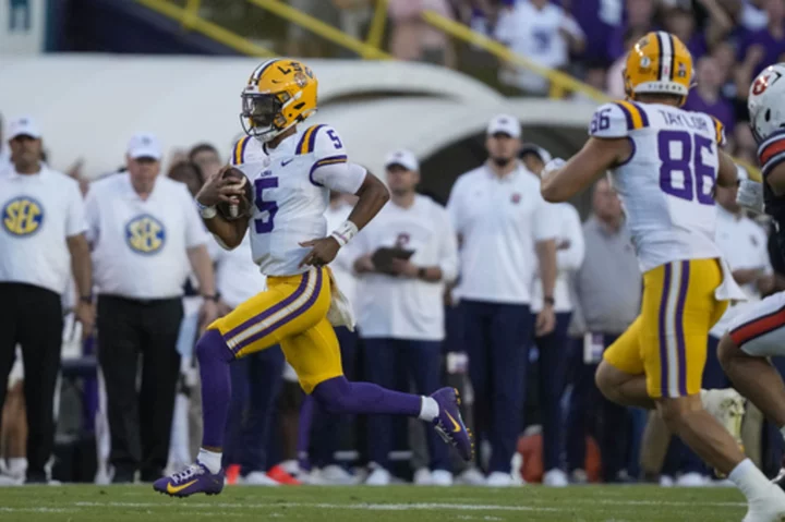 Daniels and No. 22 LSU's offense is prolific again in a 48-18 win over Auburn