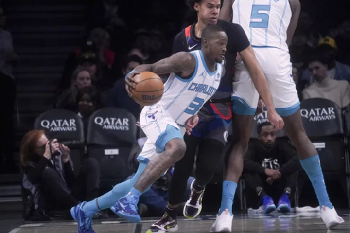 Rozier has 37 points and 13 assists, Hornets win 129-128 to snap Nets' three-game winning streak
