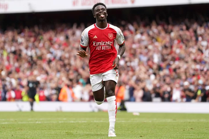 Bukayo Saka nets stunner before Arsenal forced to cling on to beat Forest