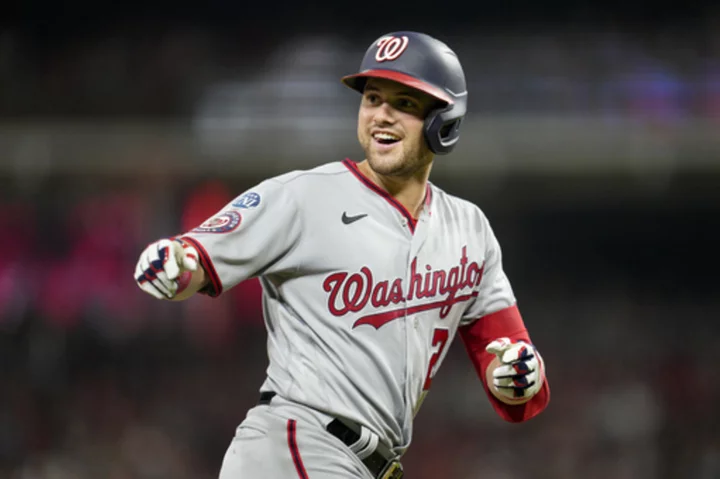 Lane Thomas hits 2nd homer of the game in the 10th inning, Nationals beat Reds 6-3