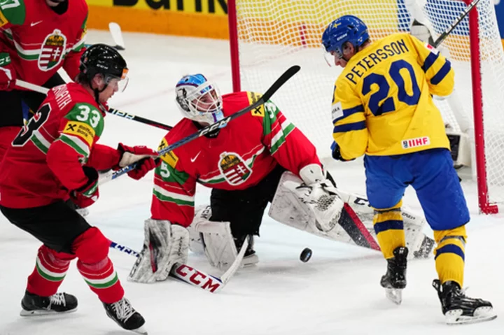 Sweden routs Hungary 7-1, Switzerland beats Slovakia 4-2 at ice hoskey worlds
