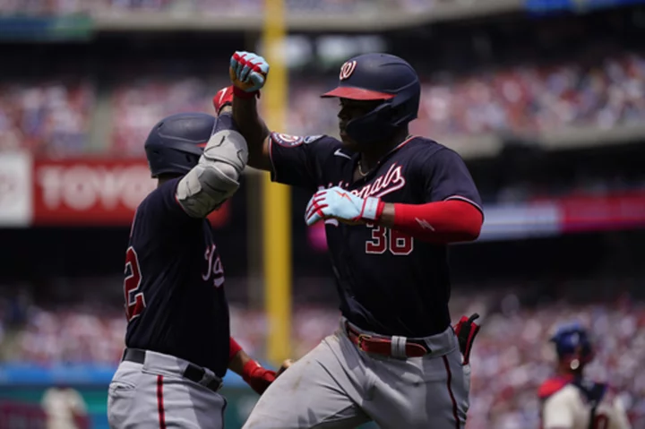 Garrett hits grand slam and Candelario homers in Nationals' 5-4 win over Phillies