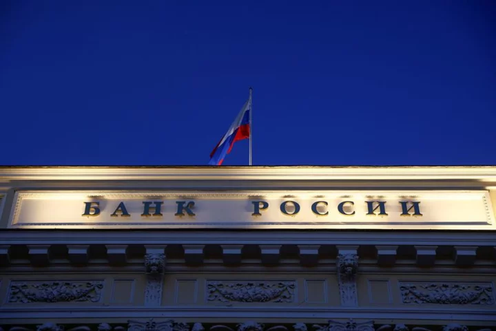 Russian central bank jacks up rates to 12% to support battered rouble