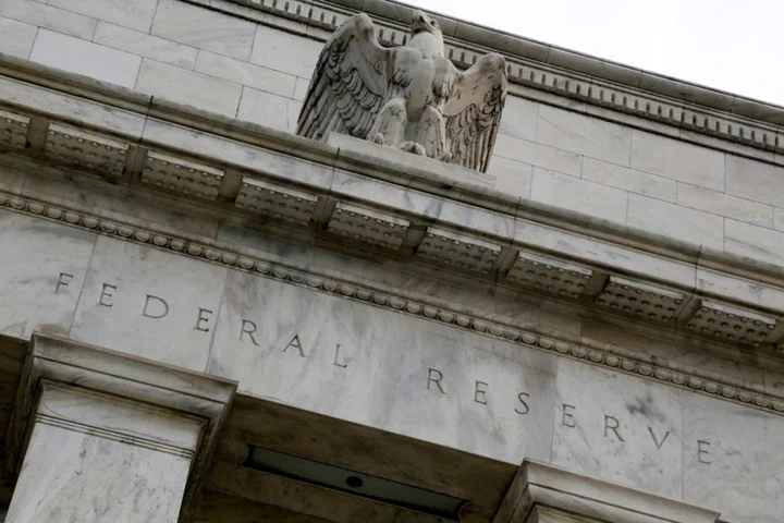 Fed sees tighter policy through 2024; Powell says new forecasts not pledge for action