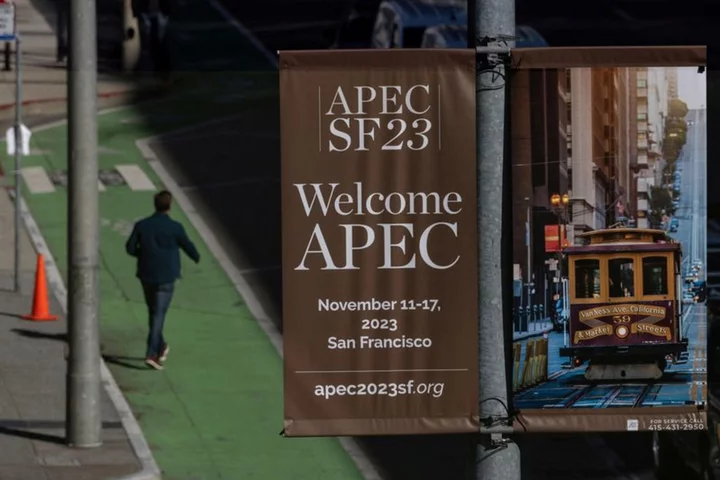 Trans-Pacific trade deal members meet at APEC summit, say open to new members