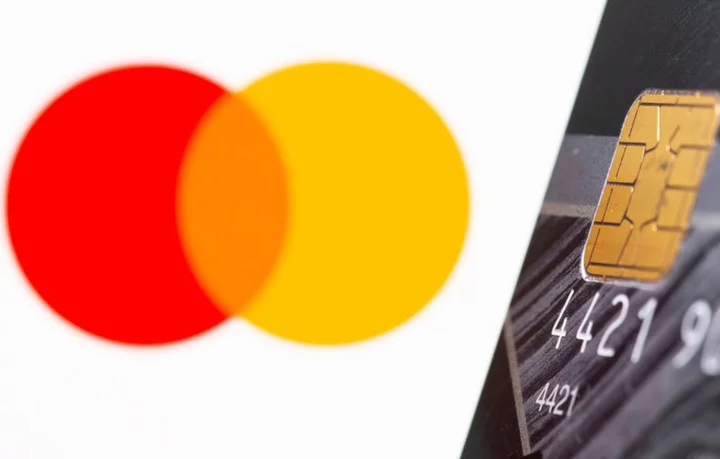 Mastercard third-quarter profit rises