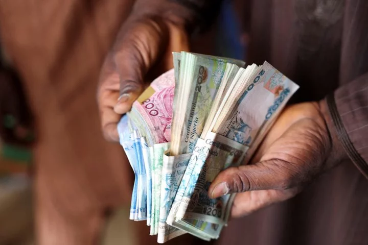 Nigeria's naira hits record low of 980 per dollar on official market -Refinitiv data