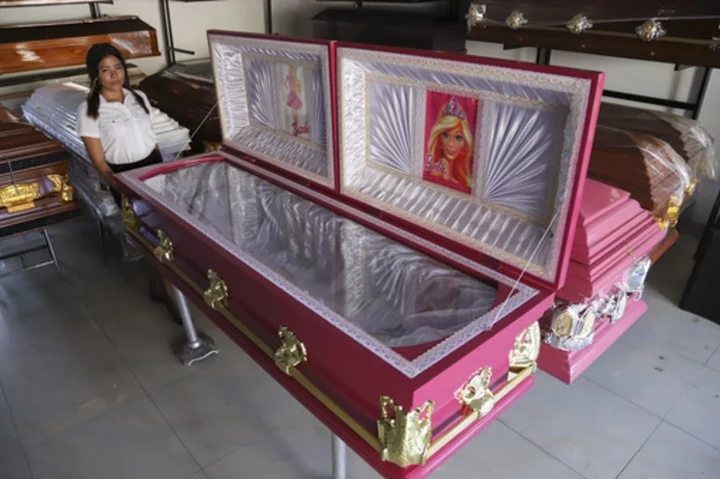 A funeral home in El Salvador offers pink coffins with Barbie linings