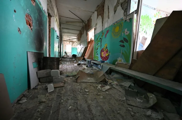 Bomb threats in Kyiv as Ukraine children go back to school