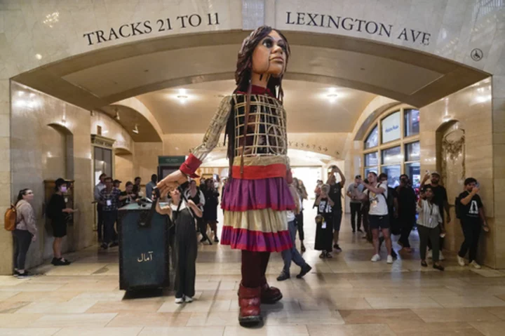 Little Amal, a 12-foot puppet of a Syrian refugee, will travel the US