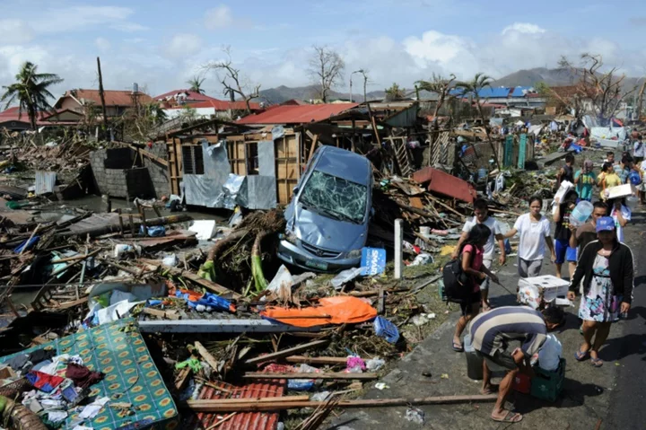 Philippine typhoon survivors pray for victims on 10th anniversary