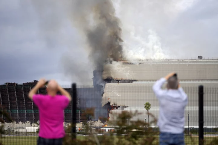 Raging fire destroys massive World War II-era blimp hangar in Southern California