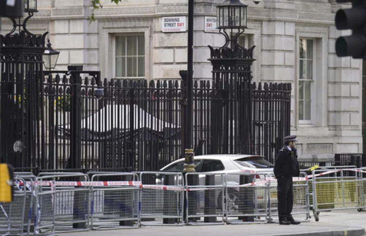 Man arrested after car collides with gates of Downing Street, where UK prime minister lives