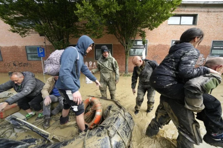 Crews work to reach Italian towns isolated by floods as cleanup begins