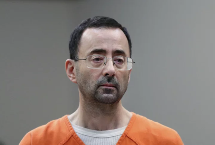 Suspect in Larry Nassar stabbing said ex-doctor made lewd remark watching Wimbledon, AP source says