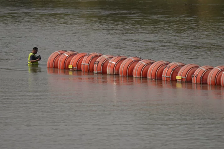 Texas moves large floating barrier on US-Mexico border closer to American soil