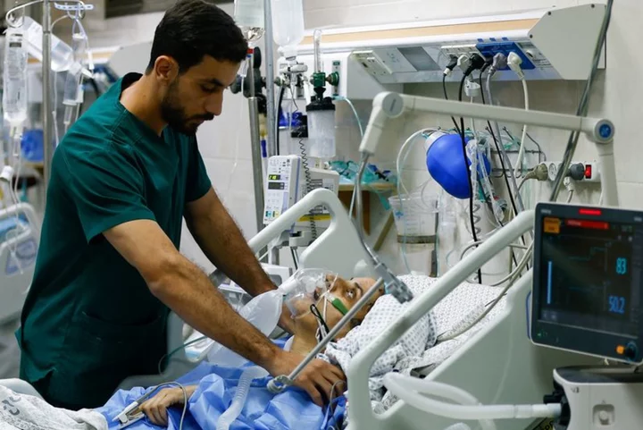 Gaza surgeons operate in corridors as Israeli bombs fill hospitals