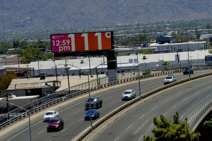 Day and night Phoenix has sweltered from heat that will break a record for American cities