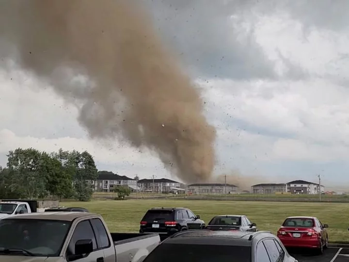 Hundreds of thousands are without power as tornado-spawning storms batter the Southeast and Ohio Valley