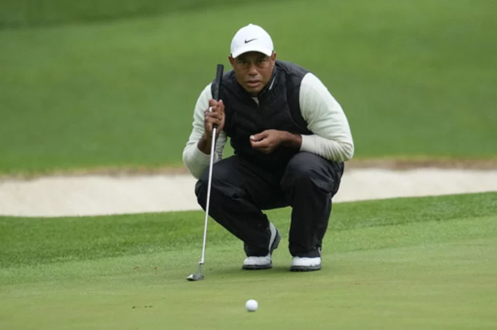 Tiger Woods says his right ankle is pain-free. It's the rest of his leg that still causes problems