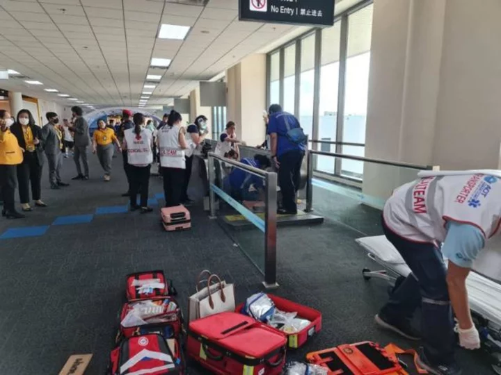 Woman's leg amputated after becoming trapped in Thai airport moving walkway