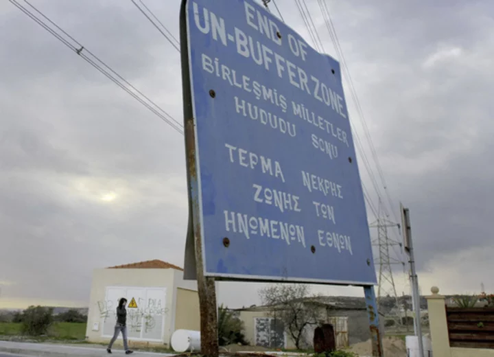 Turkish Cypriots attack UN peacekeepers trying to halt road work inside divided Cyprus' buffer zone