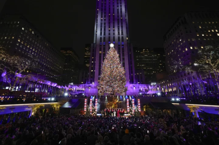 Iconic Christmas tree at Rockefeller Center illuminated in midst of pro-Palestinian protest