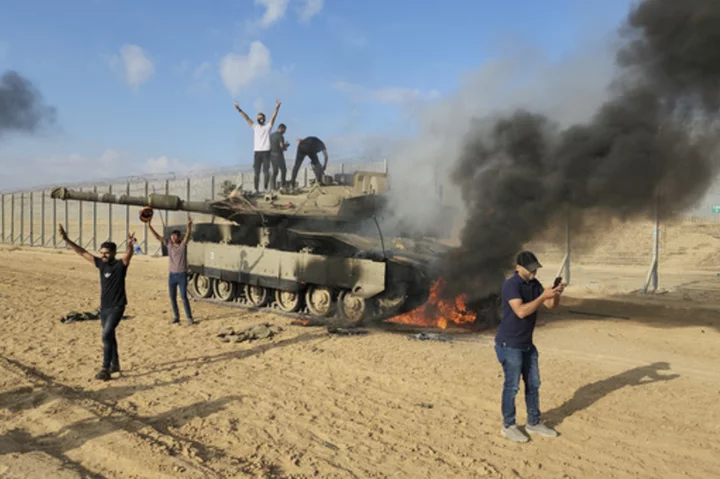 AP PHOTOS: Fear, sorrow, death and destruction in battle scenes in Israel and Gaza Strip