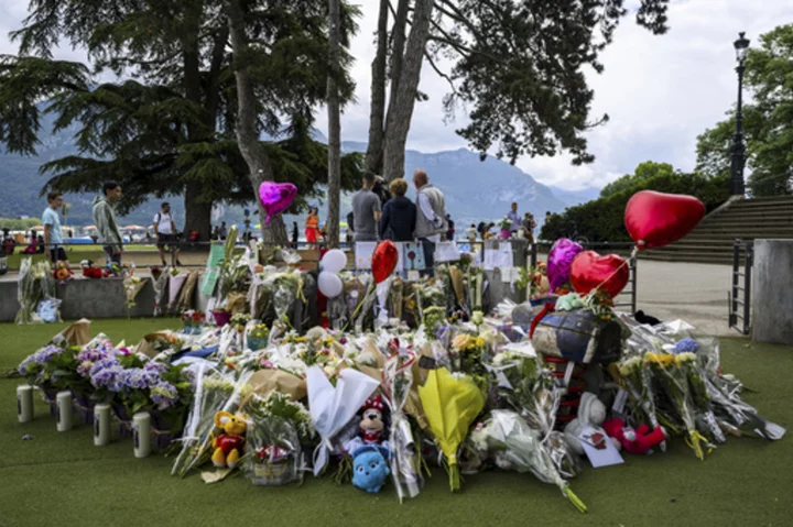French town gathers at playground where young children were stabbed to support victims