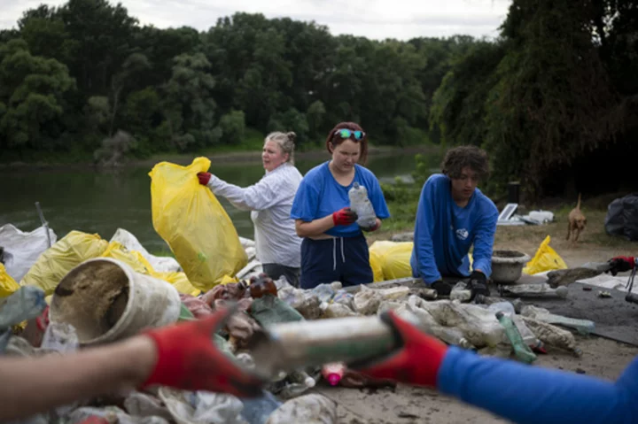 Volunteers head off plastic waste crisis by removing tons of rubbish from Hungarian river