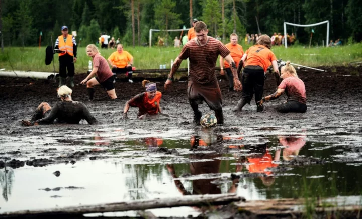 Swamp soccer world cup sees teams clash in knee-deep bog