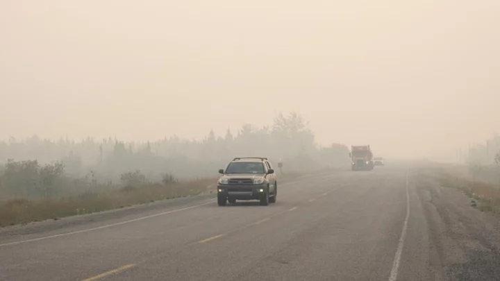 Canada wildfire: Car 'began melting' as family evacuated north