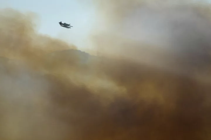 Deadly wildfires in Greece and other European countries destroy homes, threaten nature reserves