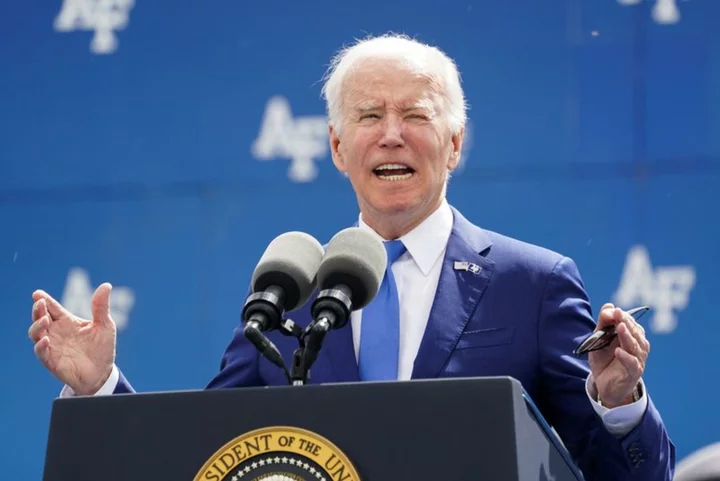 Biden trips and falls during graduation ceremony, recovers quickly