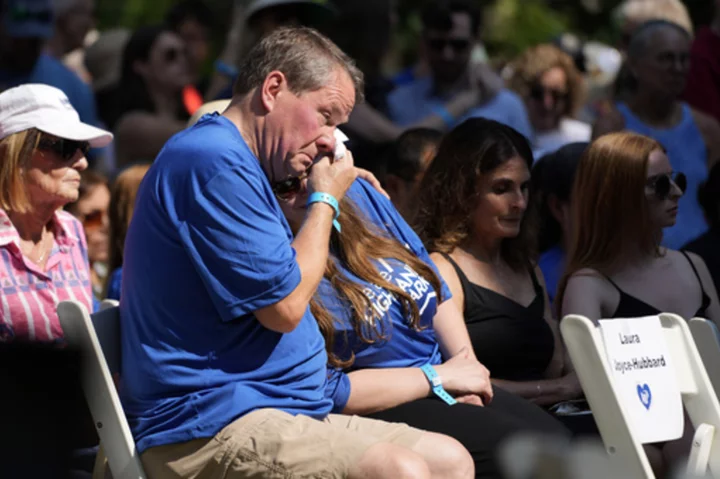 Highland Park residents walk parade route where 7 were killed in Fourth of July shooting