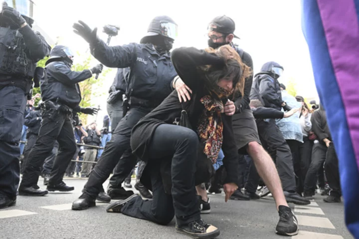 Far-left protesters clash with German police in Leipzig after trial verdict