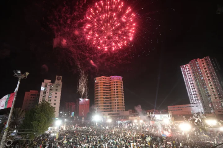 Pakistan's caretaker premier is to be sworn in as people celebrate Independence Day