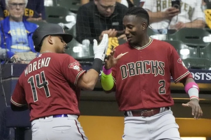 Diamondbacks hit Burnes hard to rally for 6-3 victory over Brewers in Wild Card Series opener