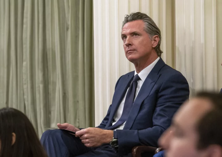 Budget troubles won't change California Gov. Gavin Newsom's goals for 2nd term, he tells AP