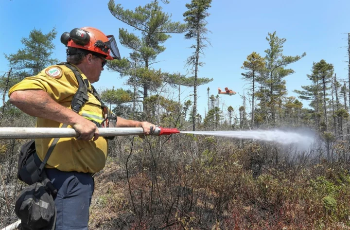 Canada's Quebec expects thousands more to flee wildfires