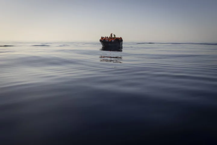 Greek authorities charge 2 migrants for destroying dinghy carrying 40 as rescue boat approached