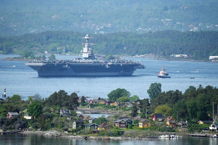 World's biggest aircraft carrier sails into Oslo for NATO exercises