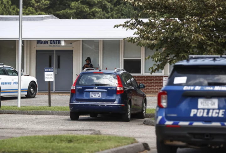 Man who tried to enter Jewish school with a gun fired twice at a construction worker, police say