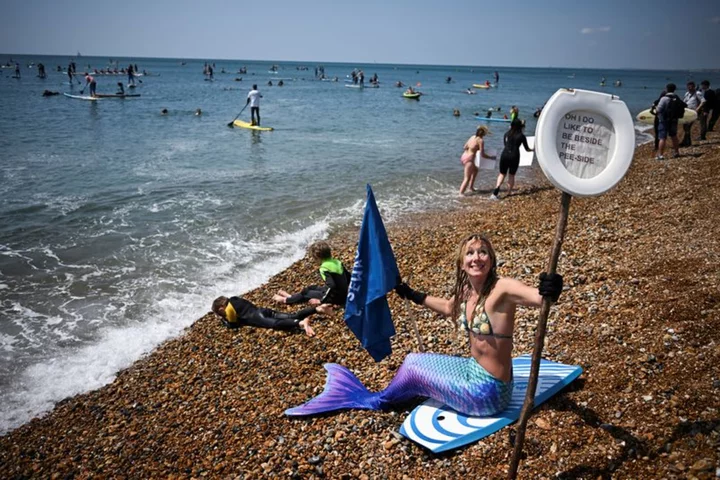 Sick of sewage, Britons protest at water companies' pollution