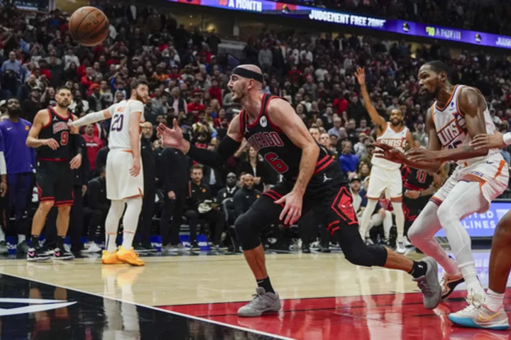 Suns outlast Bulls 116-115 in OT in Bradley Beal's season debut