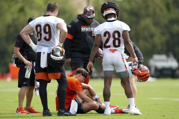 Bengals QB Joe Burrow carted off the practice field after calf injury