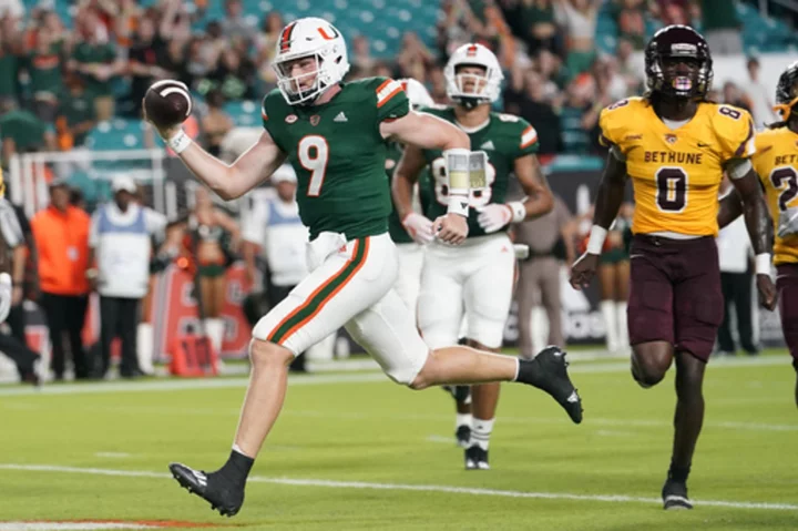 Van Dyke accounts for 3 TDs, No. 22 Miami routs FCS member Bethune-Cookman 48-7