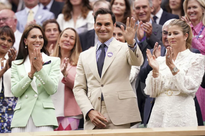 Roger Federer receives a lengthy standing ovation at Wimbledon from fans. And from Princess Kate